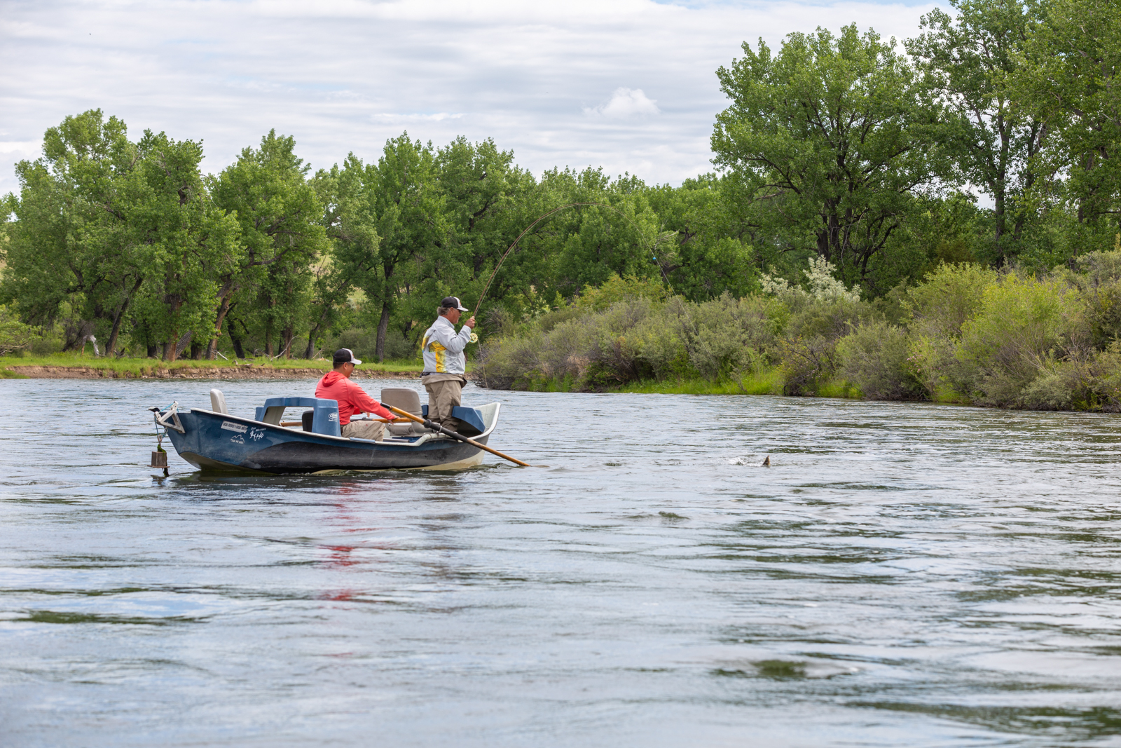 two fly fishers in a boat
