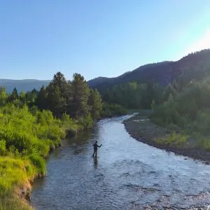 man fishing on western ranches for sale