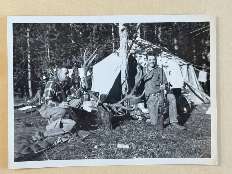 old photo of two hunters at Elk Camp at Antlers Ranch in Wyoming