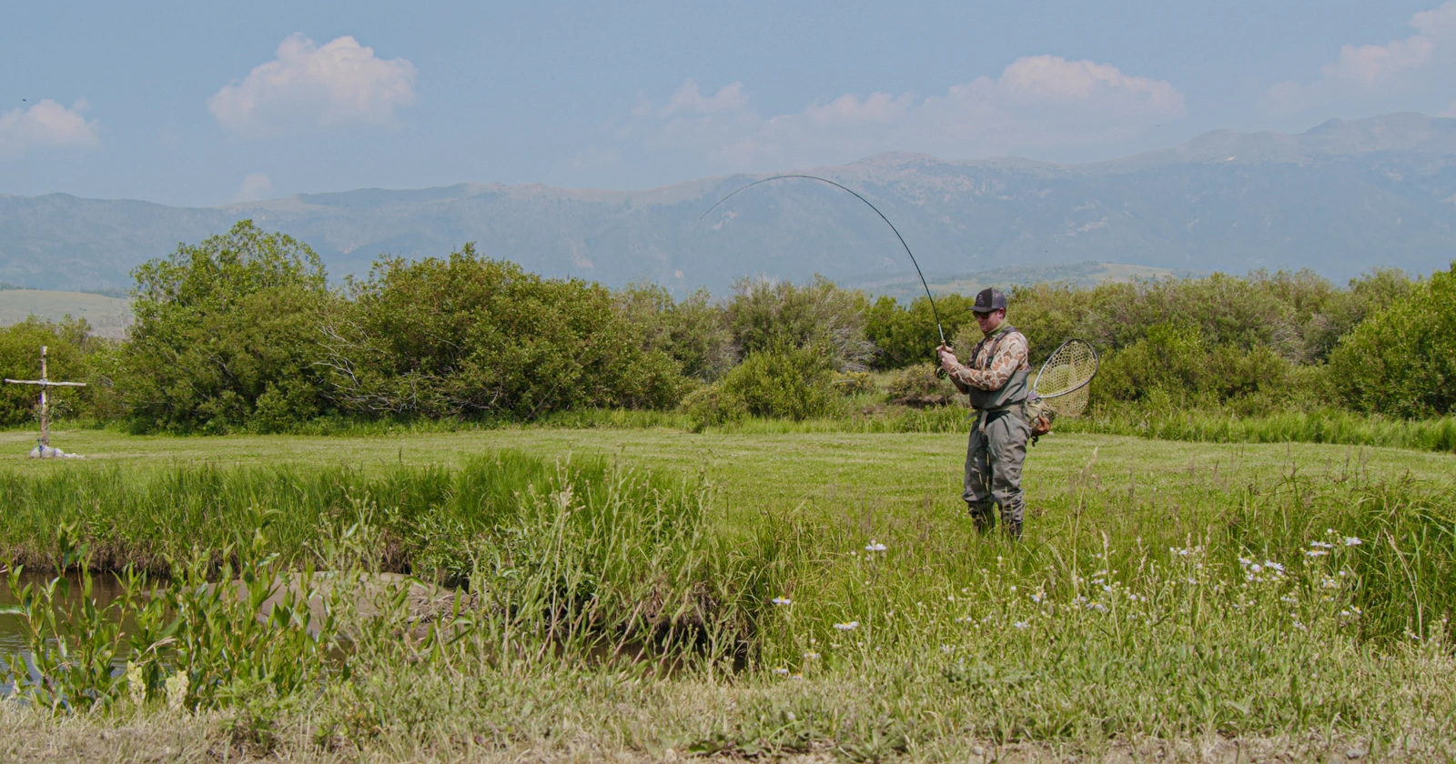 man fishing on Medicine Bow Ranch